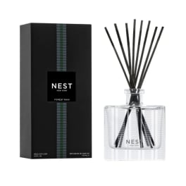 Reed diffuser set with a black box and clear glass bottle