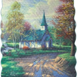 Quilted blanket with a church scene and Bible verse text