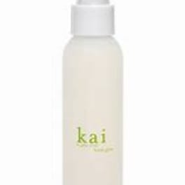 A white spray bottle with a green kai label