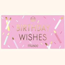 Pink birthday wishes card with gold lettering and confetti design