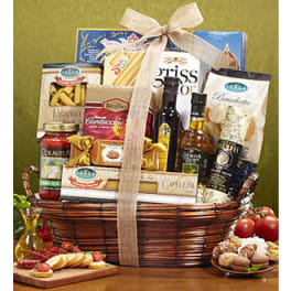 Gift basket with pasta, sauces, oils, and crackers tied with a ribbon