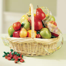 Fruit basket with pears and apples, plus wrapped candies