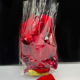Wrapped red rose petals in clear plastic packaging