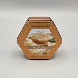 Hexagonal tin candle labeled Bourbon Pear