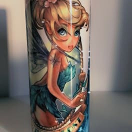 Tall white tumbler with a fairy illustration and text