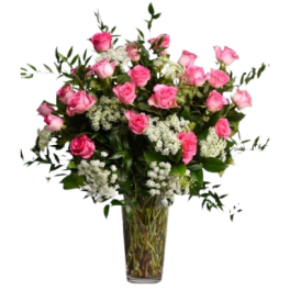 Tall glass vase arrangement with pink roses and white accent flowers