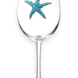 Clear wine glass with a blue jeweled starfish design