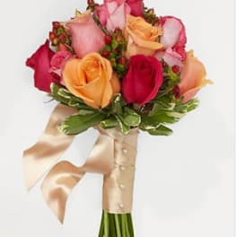Bouquet of multicolored roses tied with a satin ribbon