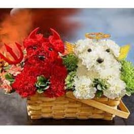 Two flower-covered dog figurines in a wicker basket