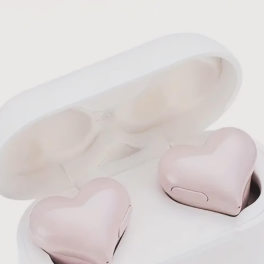 Two pink heart-shaped boxes in a clear plastic case