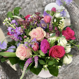 Mixed bouquet of pink, purple, and white flowers