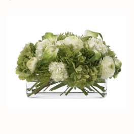 Low rectangular glass vase with green and white hydrangeas, calla lilies, and roses