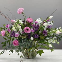 Pink and white mixed bouquet in a glass vase