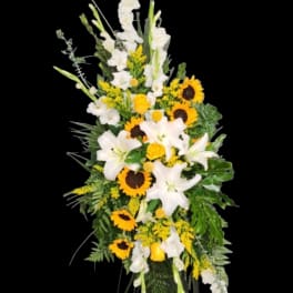 Tall floral spray with white lilies and sunflowers