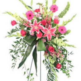 Standing floral spray with pink lilies, gerbera daisies, and roses