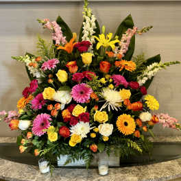 Large mixed bouquet with roses, gerbera daisies, lilies, and snapdragons