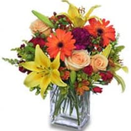 Colorful mixed bouquet in a clear glass vase
