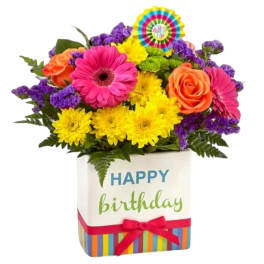 Colorful mixed flower bouquet in a birthday gift box