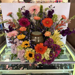 Colorful mixed flower arrangement with gerbera daisies and lilies