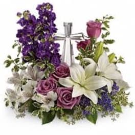 Mixed bouquet with purple flowers, pink roses, and white lilies