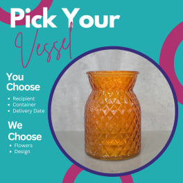 Amber textured glass vase on a teal graphic background