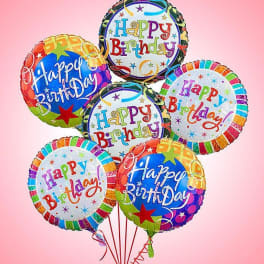 Cluster of colorful birthday balloons with "Happy Birthday" text