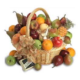 Basket of assorted fruit with a bow and a small cheese box