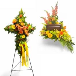 Two standing floral sprays with orange and yellow flowers on easels
