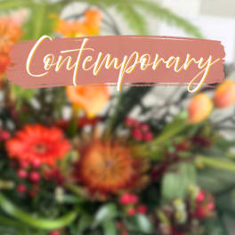 Blurred floral arrangement with the word "Contemporary" across the center