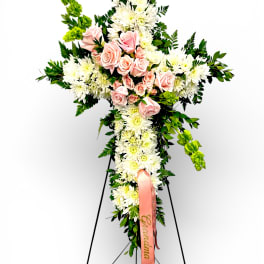 Standing floral cross with white daisies and pink roses