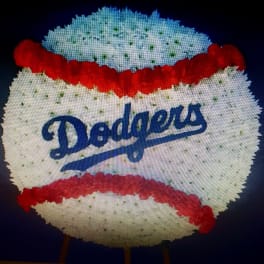 Dodgers-themed floral display shaped like a baseball