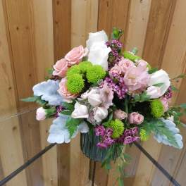 Bouquet of pink and white flowers in a glass vase