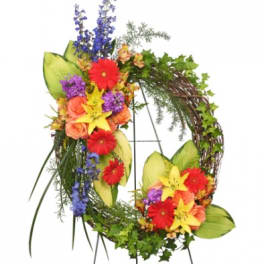 Colorful floral wreath with red, yellow, purple, and orange blooms