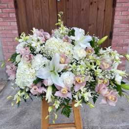white and pink casket or Urn spray