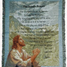 Woven wall hanging with The Lord's Prayer and a praying figure