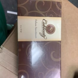 Box of deluxe assorted chocolates in brown packaging