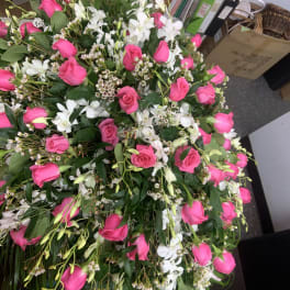Large bouquet of pink roses and white orchids