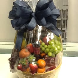 Fruit basket with a large blue bow
