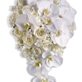 White orchid and rose bouquet with cascading blooms