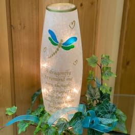 Dragonfly memorial lantern with ivy and blue ribbon