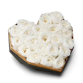 Heart-shaped box filled with white ranunculus blooms