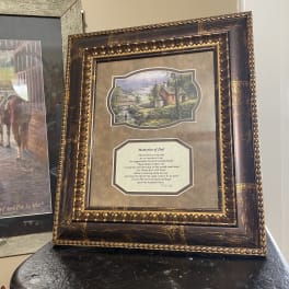 Framed memorial print with a countryside scene and poem