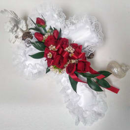 Red rose bouquet with white lace and ribbon accents