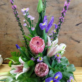 Mixed bouquet with pink, purple, and white flowers