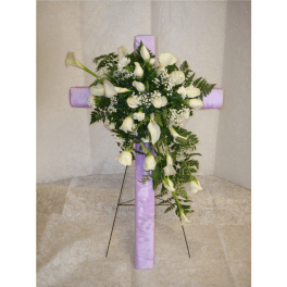 White calla lily and rose arrangement on a lavender cross stand