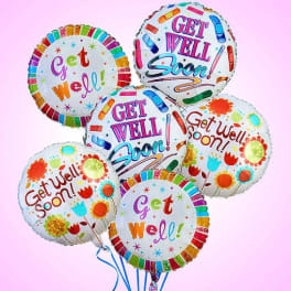 Cluster of colorful get-well balloons on a pink background