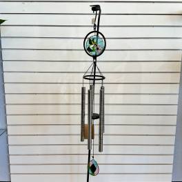 Decorative wind chime with stained-glass accents and metal tubes