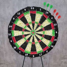 Large floral dartboard display with numbered sections and colored flower wedges