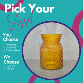 Amber glass vase with a faceted diamond pattern