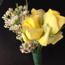 Yellow rose bouquet with small white filler flowers